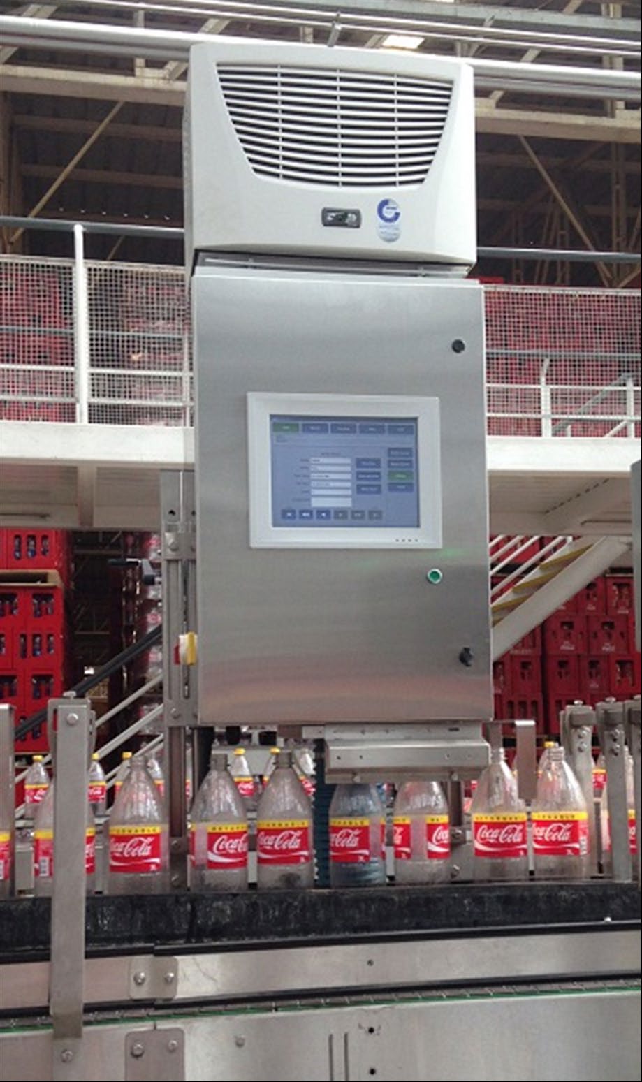 ENOS Mass Spec second-barrier sniffer station on a bottling line